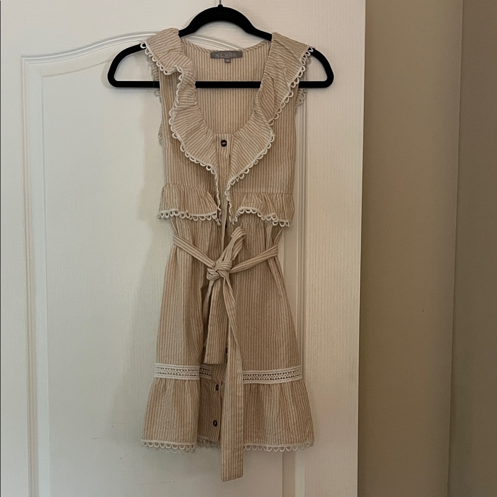 Shop Hope’s Tan Sleeveless Ruffle Dress with Lace Trim
